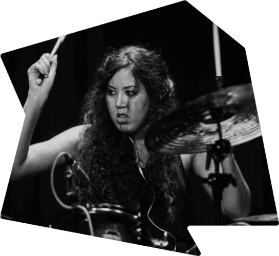 Drummer practicing with excitement on his drum set." Image Title: "Drummer's Exciting Practice - Fun Behind the Kit